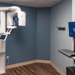 Tech scanner and computer at {PRACTICE_NAME} 